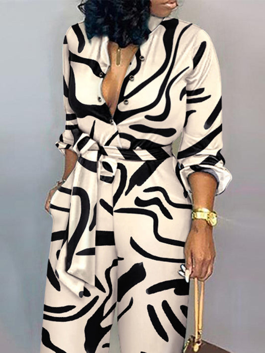 Women's fashion commuting abstract print long-sleeved jumpsuit Sizing: True to size Material composition: 100% Polyester Clothing type: H Material: Polyester Pattern: Self design Fabric elasticity: No elasticity Season: Spring-Summer Weaving type: Woven S
